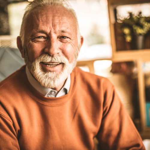 brookline Independent senior living elderly man in orange shirt