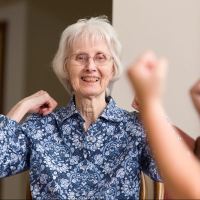 Mount Joy Senior Living Elderly woman exercising in a class (Testimonial)