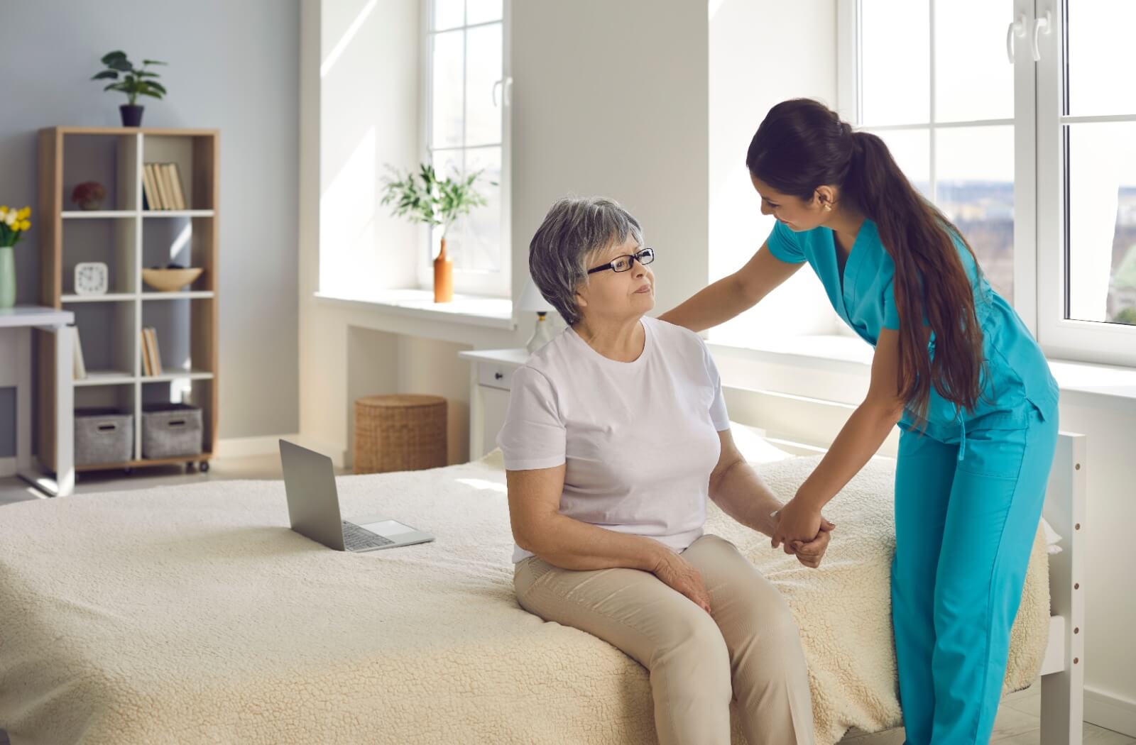 An assisted living staff checking in on a senior resident.