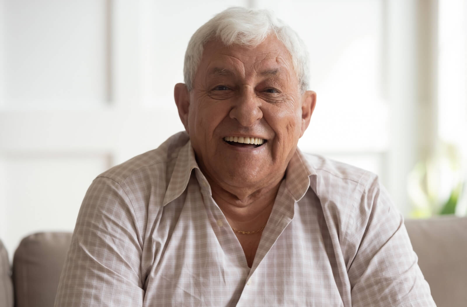 A happy resident of an assisted living community.