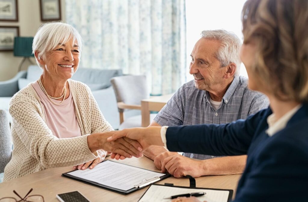 An older couple meets with their elder law attorney.