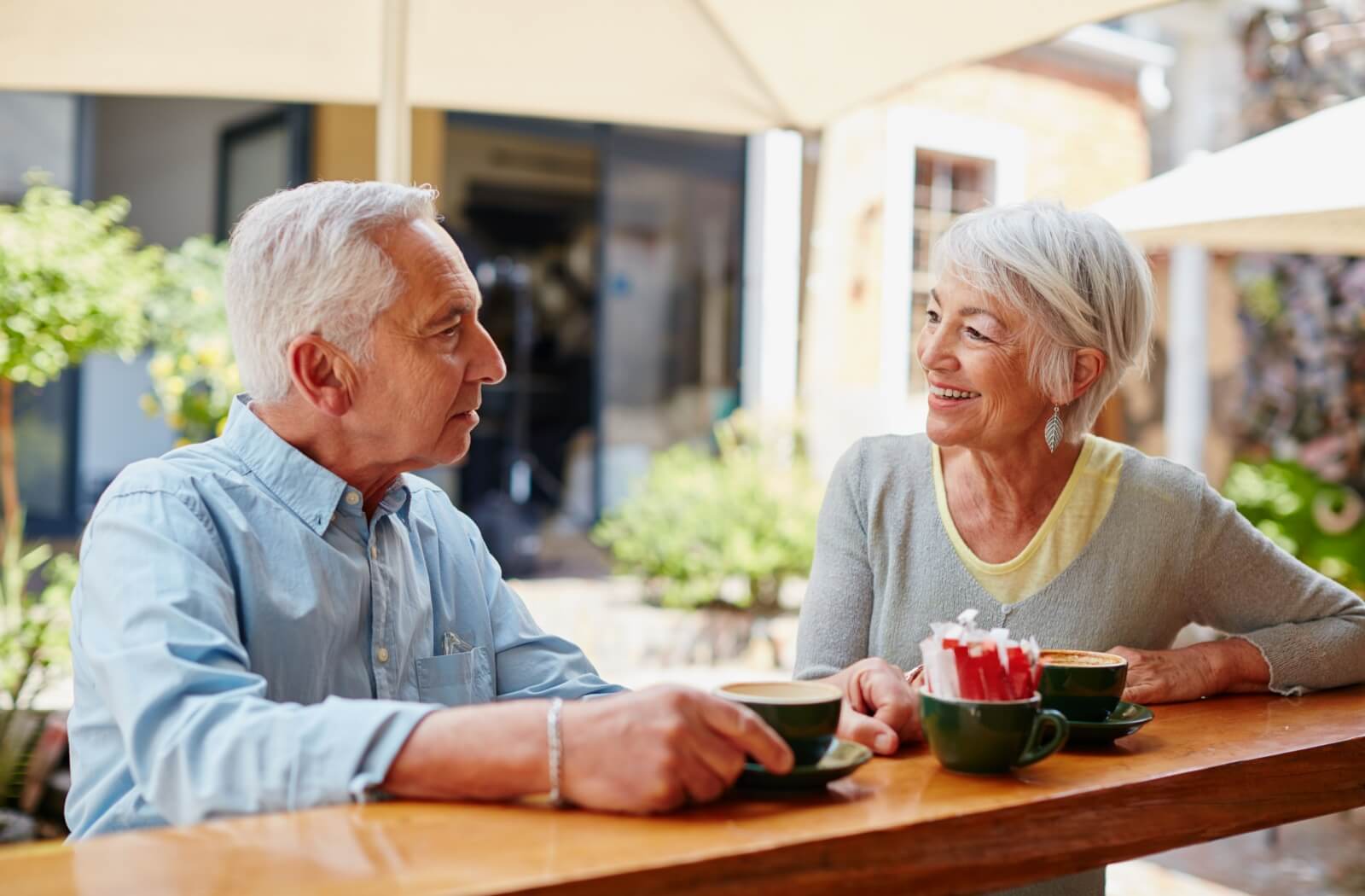 Two mature adults on a coffee date.