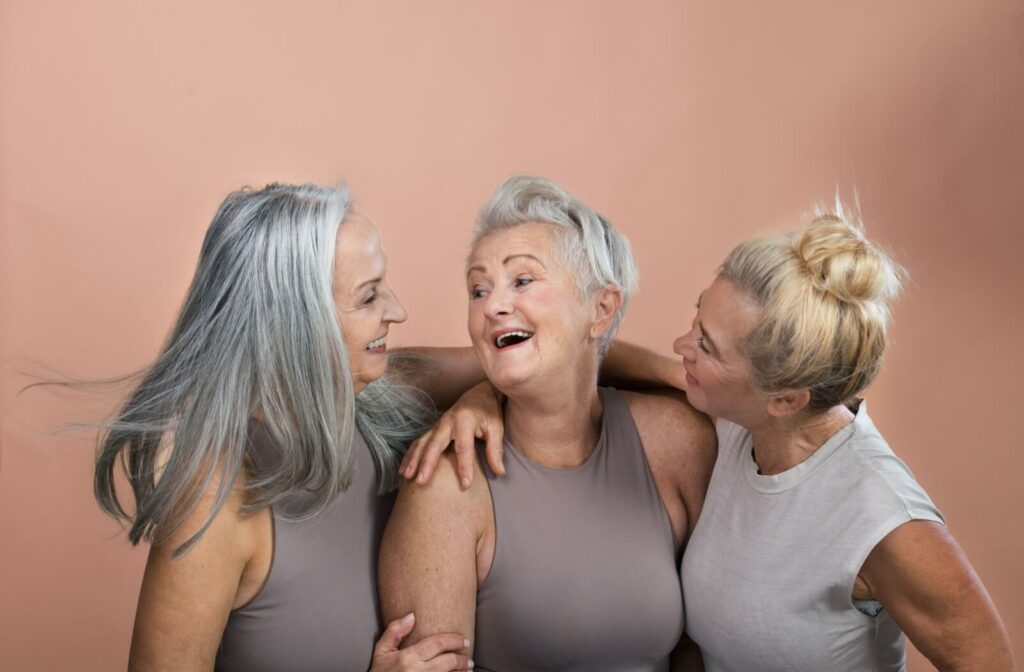 seniors smiling to each other and posing
